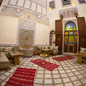 Taj Fez